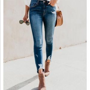 Distressed high waisted skinnies. NEW/NEVER WORN!